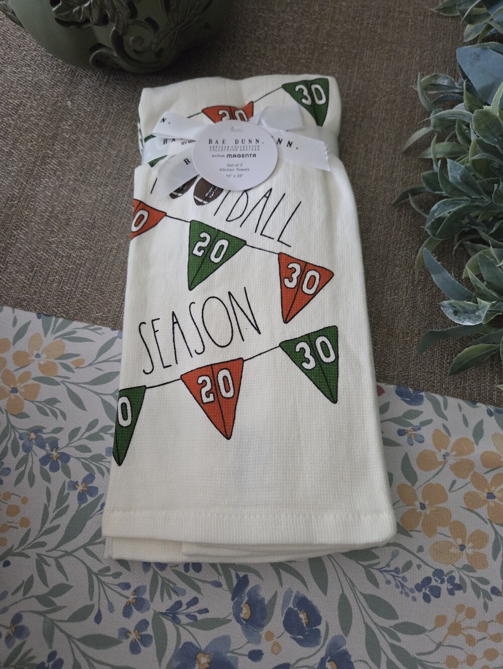 Rae Dunn White Kitchen Towels with Green and Orange Pennant Design
